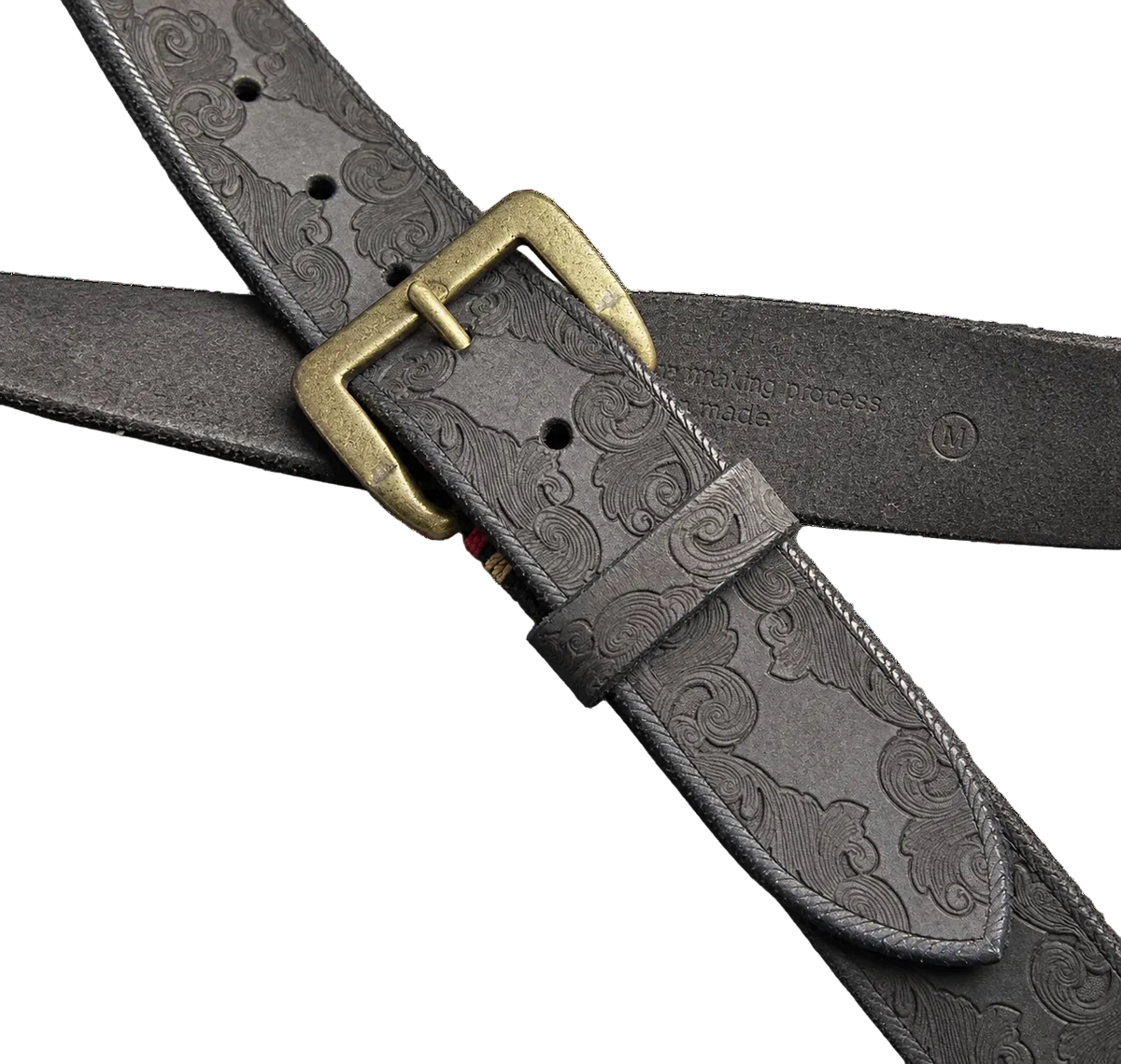 Tooled Leather Belt in Black, close-up of the buckle and tooling