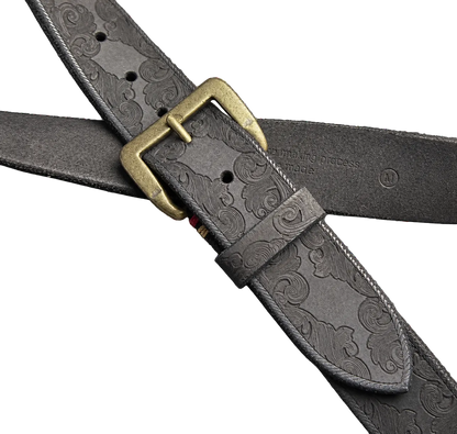 Tooled Leather Belt in Black, close-up of the buckle and tooling