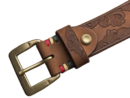 Tooled Leather Belt in Tobacco, close-up of the brass pin buckle