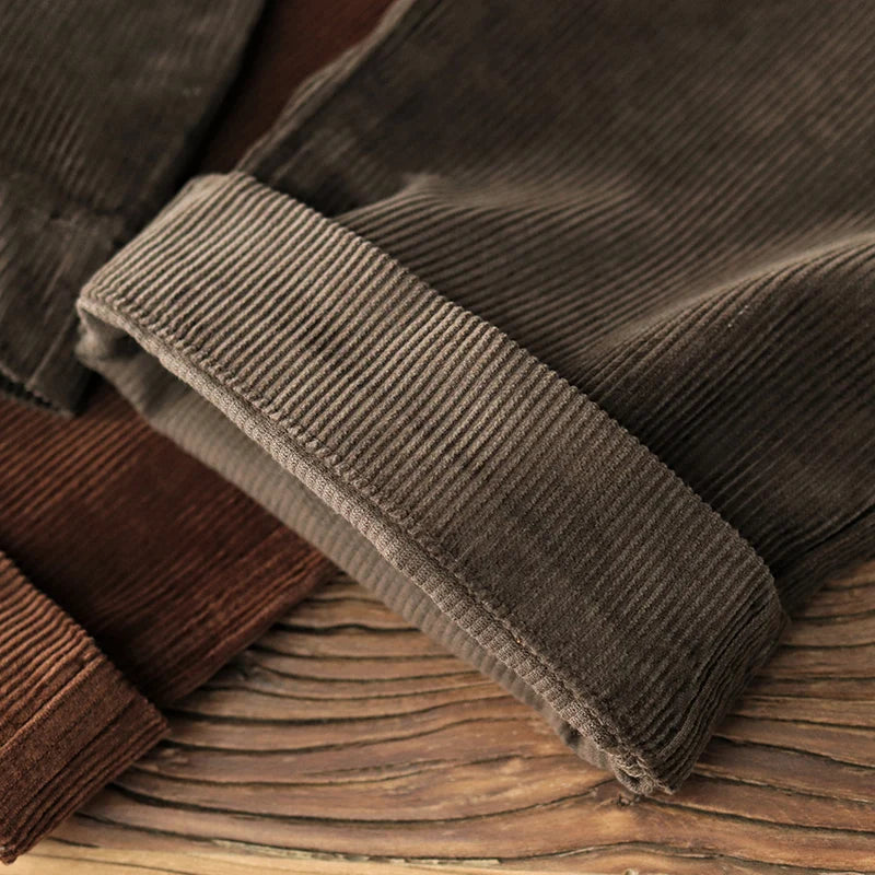Macro of the cuffed hem and wide wale corduroy