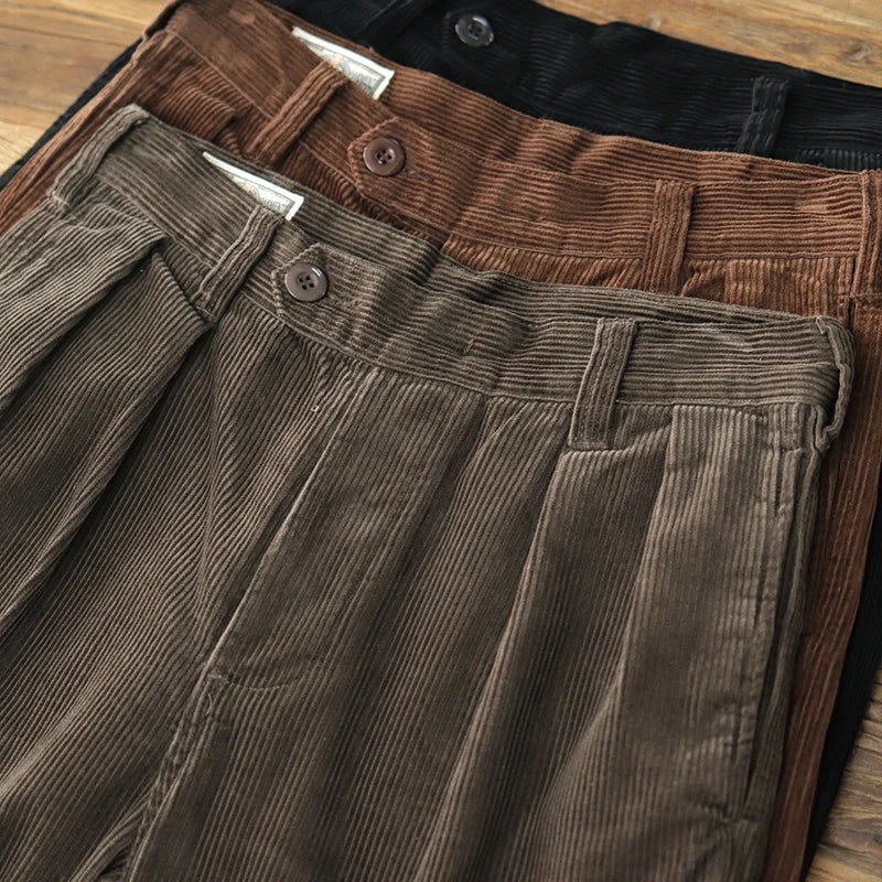 The three colors stacked, Dark Olive, Coffee and Black, showing the double front pleats and waistband
