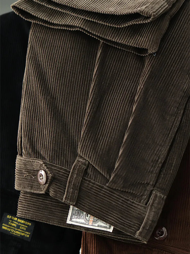 Cuffed hem and wide wale corduroy texture, trousers folded