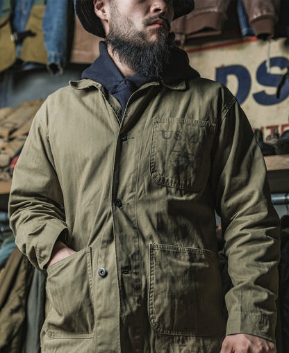 Man wearing the P41 jacket with hands in the hem pockets