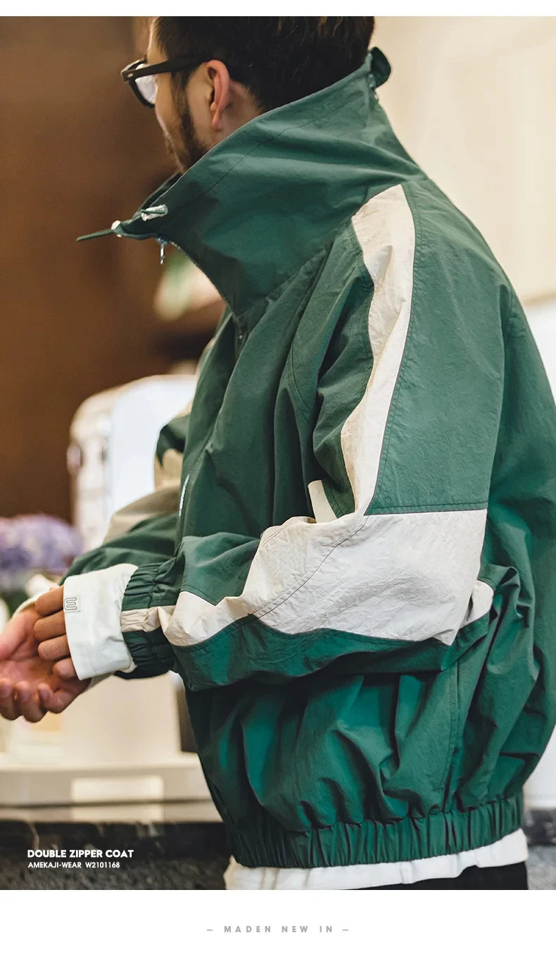 North Wind Nylon Windbreaker in Expedition Green, worn, side view