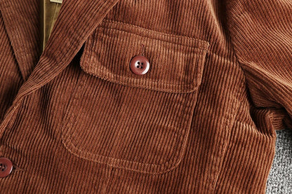 Chest patch pocket with button flap on the Corduroy Worker Blazer in Rust