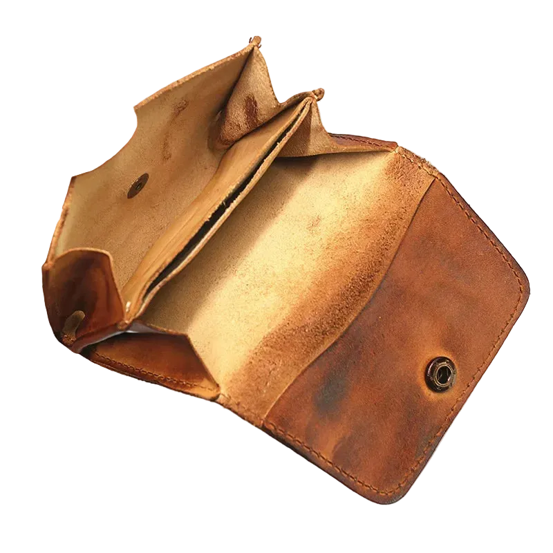 Nomad Leather Wallet open, showing the compartments and the snap closure