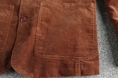 Lower patch pocket and front buttons on the Corduroy Worker Blazer in Rust