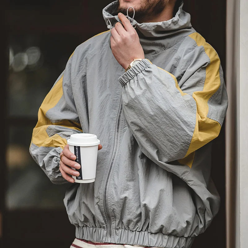 North Wind Nylon Windbreaker in Mist Grey, worn, close-up of the collar