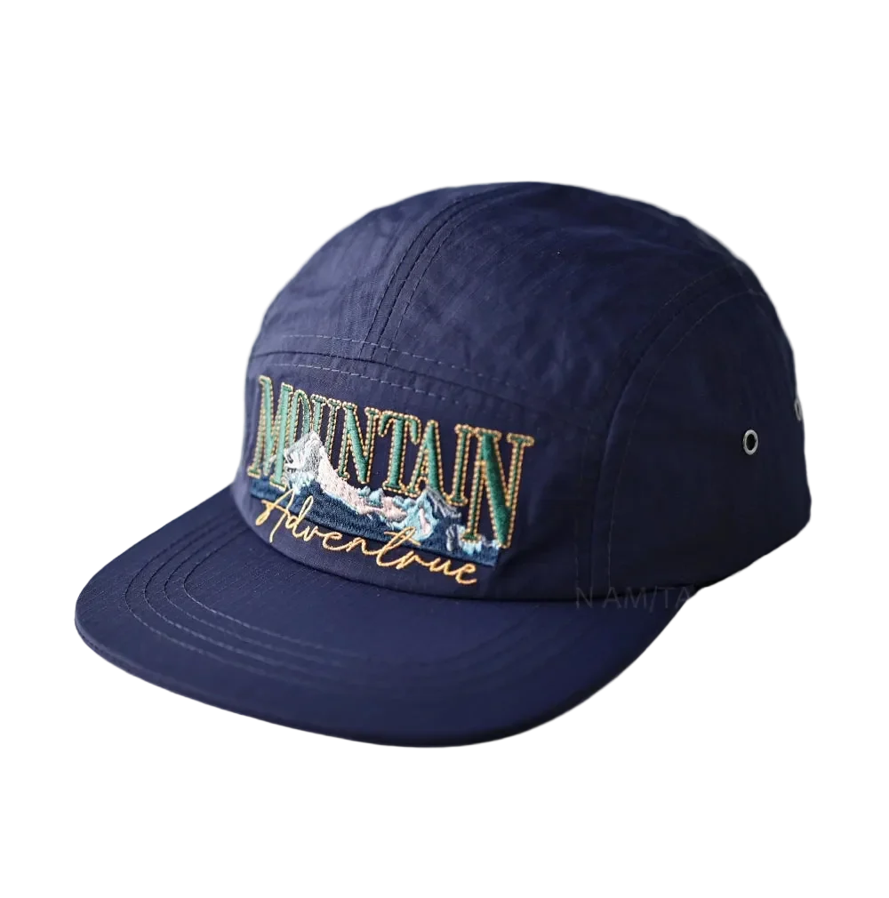Mountain Adventure Camper Cap in Navy, front view with the embroidery