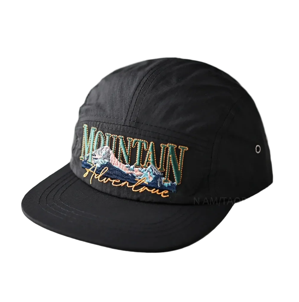 Mountain Adventure Camper Cap in Black, front view with the embroidery