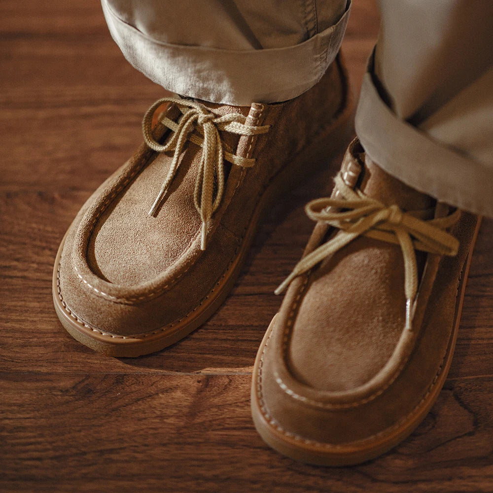 Suede Desert Shoe worn with khaki trousers, close-up of the moc toe