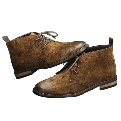 Pampa Suede Chukka Boot in Coffee, pair on a wooden floor
