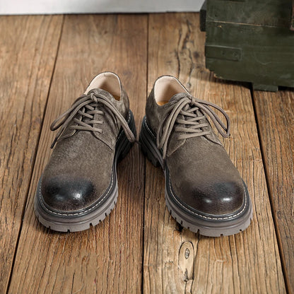 Workshop Suede Derby in Taupe, pair front view on wood