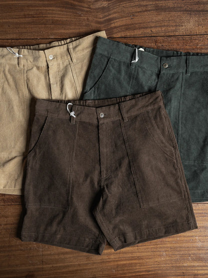 70s Longboard Corduroy Shorts in the three colors on a wooden table