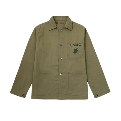 P41 Herringbone Utility Jacket in Army Green, front view on black, with the stencil on the chest pocket