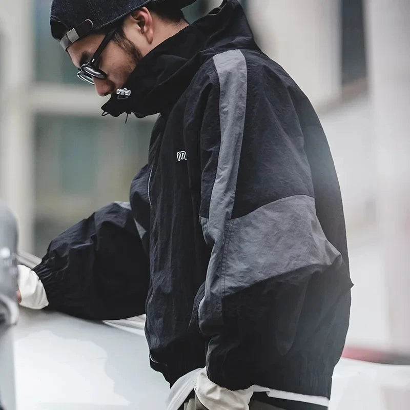 North Wind Nylon Windbreaker in Smoke Black, worn