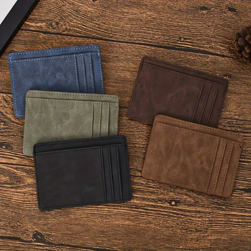 The five colors of the Open Road Slim Card Holder on a wooden table