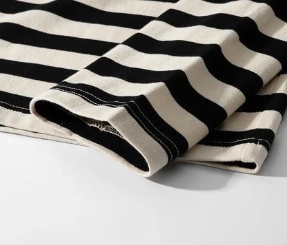 Sleeve cuff of the striped tee folded over