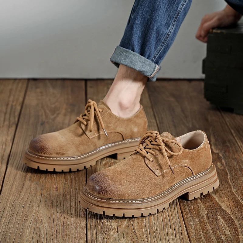 Workshop Suede Derby in Camel, front view on the feet, with rolled jeans